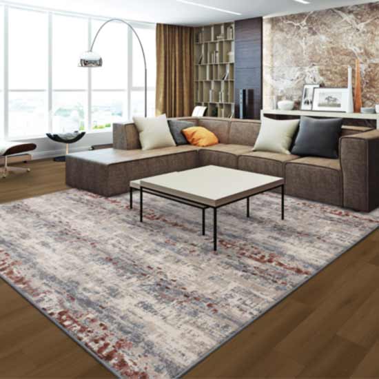 area rug in living room with wood look flooring